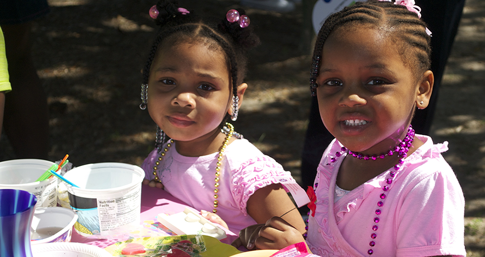 Two young girls at an event on the Courthouse Square.